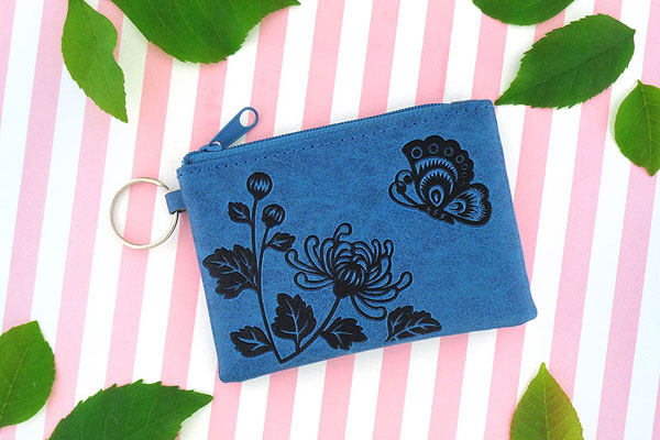 LAVISHY Akina collection wholesale fun vegan chrysanthemum flower & butterfly embossed coin purses to gift shop, clothing & fashion accessories boutique, book store in Canada, USA & worldwide since 2001.