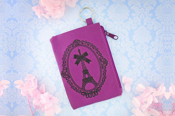 LAVISHY Akina collection wholesale fun vegan Paris Eiffel Tower embossed coin purses to gift shop, clothing & fashion accessories boutique, book store in Canada, USA & worldwide since 2001.