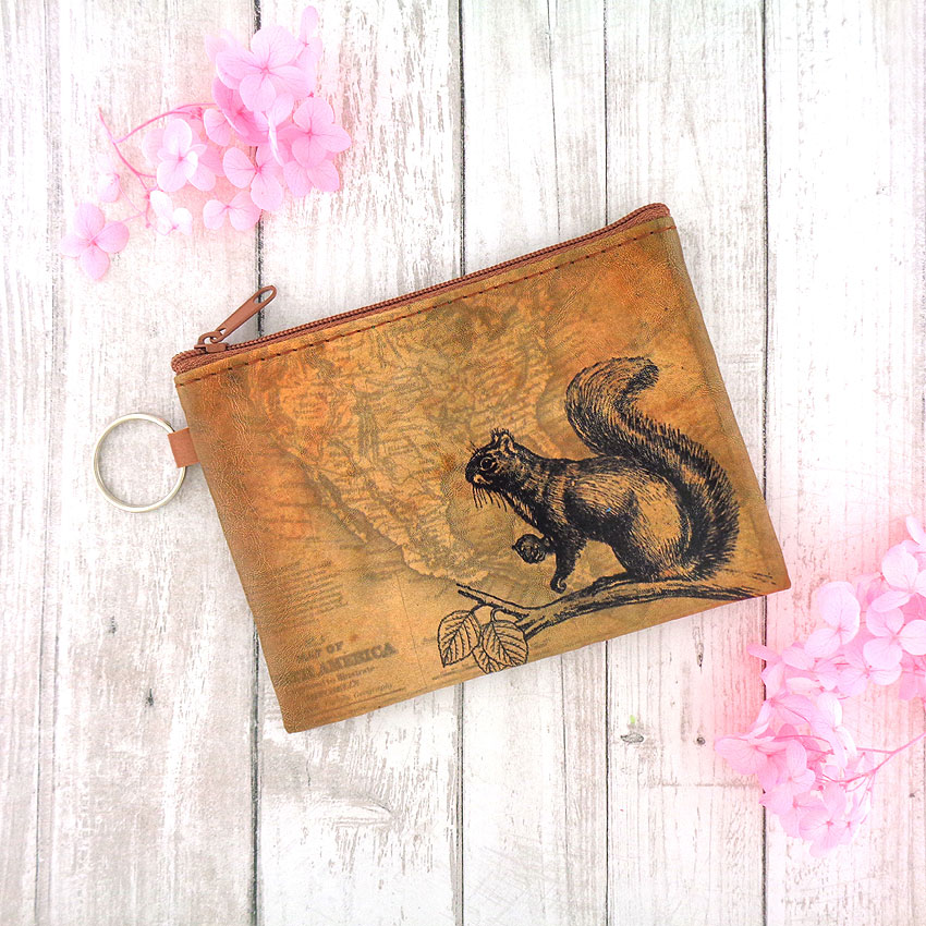 LAVISHY design & wholesale unisex vegan coin purses to gift shops, clothing & fashion accessories boutiques, book stores and speciality retailers in Canada, USA and worldwide.