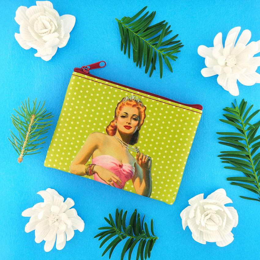 LAVISHY design & wholesale vegan pinup girl print coin purses to gift shops, clothing & fashion accessories boutiques, book stores and speciality retailers in Canada, USA and worldwide.