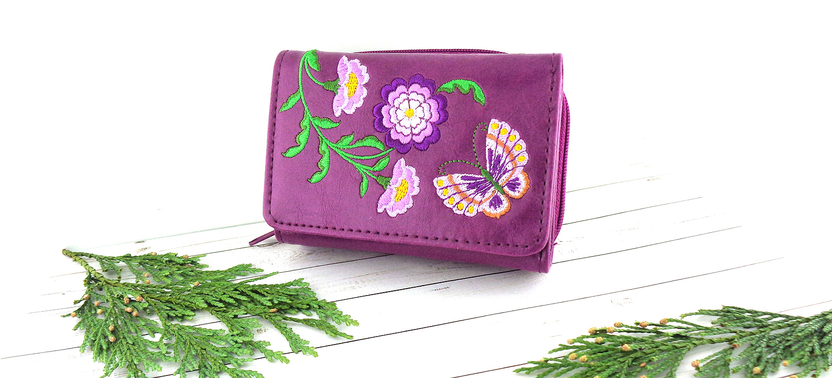 LAVISHY Elma collection design & wholesale embroidered small wallets with flower & butterfly embroidery motif to gift shops, boutiques & book stores in Canada, USA and worldwide since 2001.