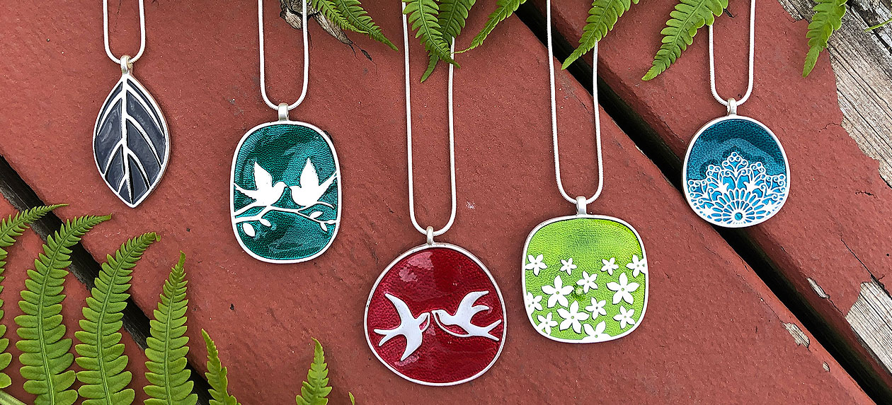 LAVISHY LAVA collection design & wholesale handmade silver plated colorful enamel reversible pendant designer fashion necklaces to gift shops, boutiques & book stores in Canada, USA and worldwide since 2001.
