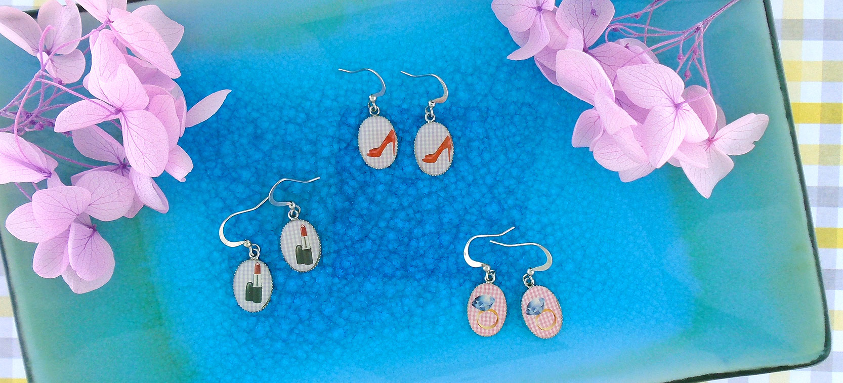 LAVISHY Lovely collection wholesale handmade dainty earrings with fun prints to gift shops, boutiques & book stores in Canada, USA and worldwide.