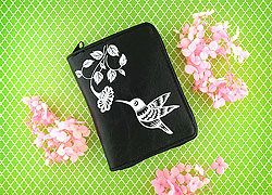 LAVISHY Akina collection wholesale fun vegan hummingbird & flower embossed medium wallets to gift shop, clothing & fashion accessories boutique, book store in Canada, USA & worldwide since 2001.