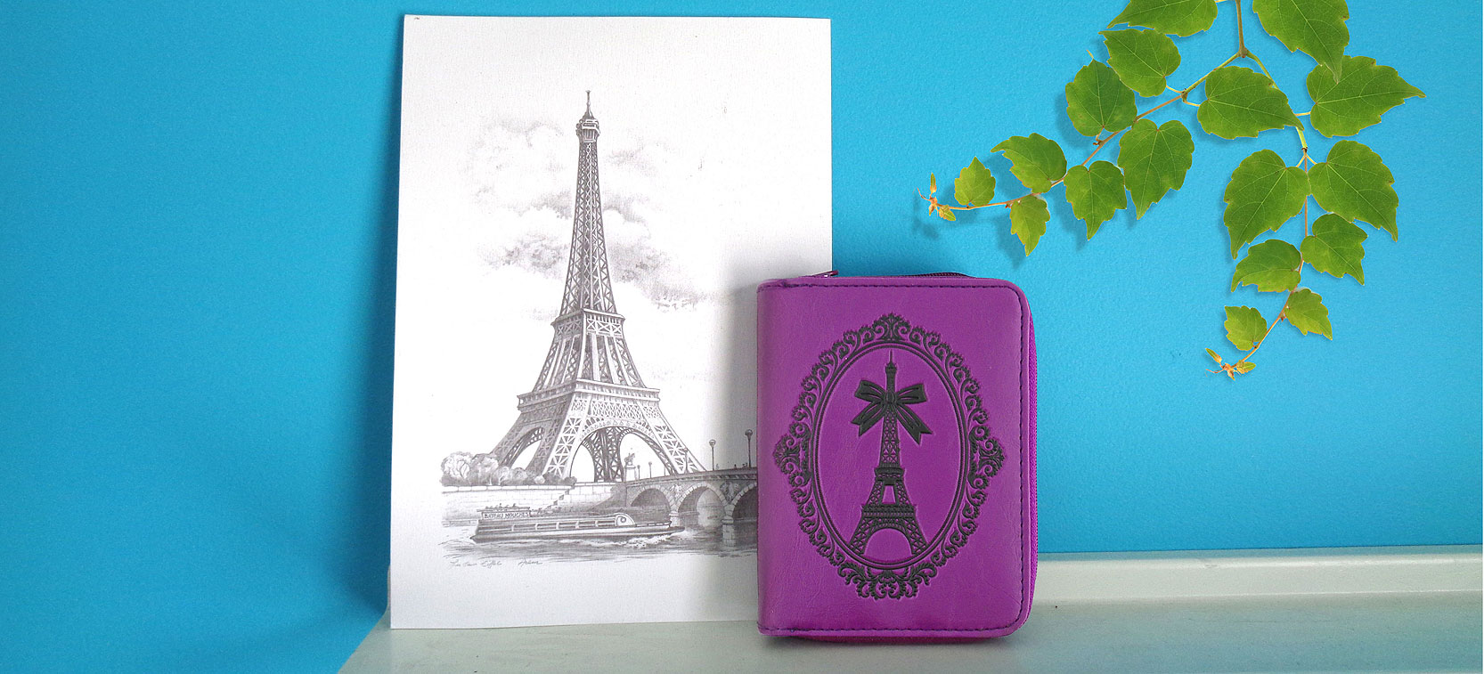 LAVISHY design & wholesale vegan embossed Paris Eiffel Tower medium wallets to gift shops, boutiques & book stores in Canada, USA & worldwide.