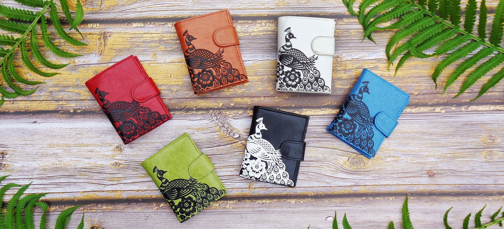 LAVISHY design & wholesale vegan embossed peacock & peony flower medium wallets to gift shops, boutiques & book stores in Canada, USA & worldwide.