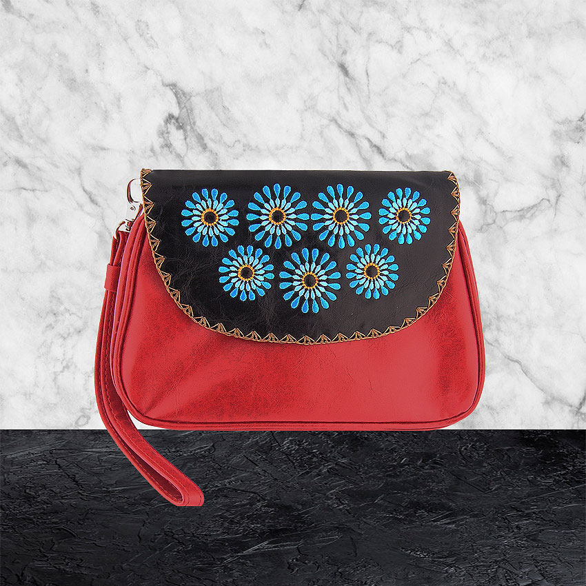 LAVISHY design & wholesale unisex vegan corssbody embroidered clutches to gift shops, clothing & fashion accessories boutiques, book stores and speciality retailers in Canada, USA and worldwide.