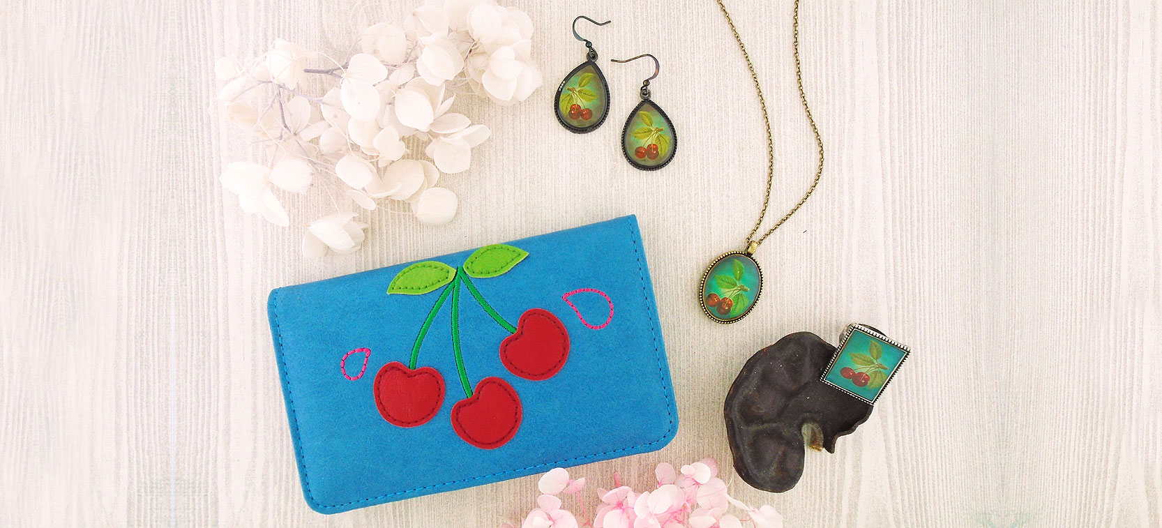LAVISHY design and wholesale cherry themed vegan accessories and gfits to gift shops, boutiques and book shops, souvenir stores in Canada, USA and worldwide.