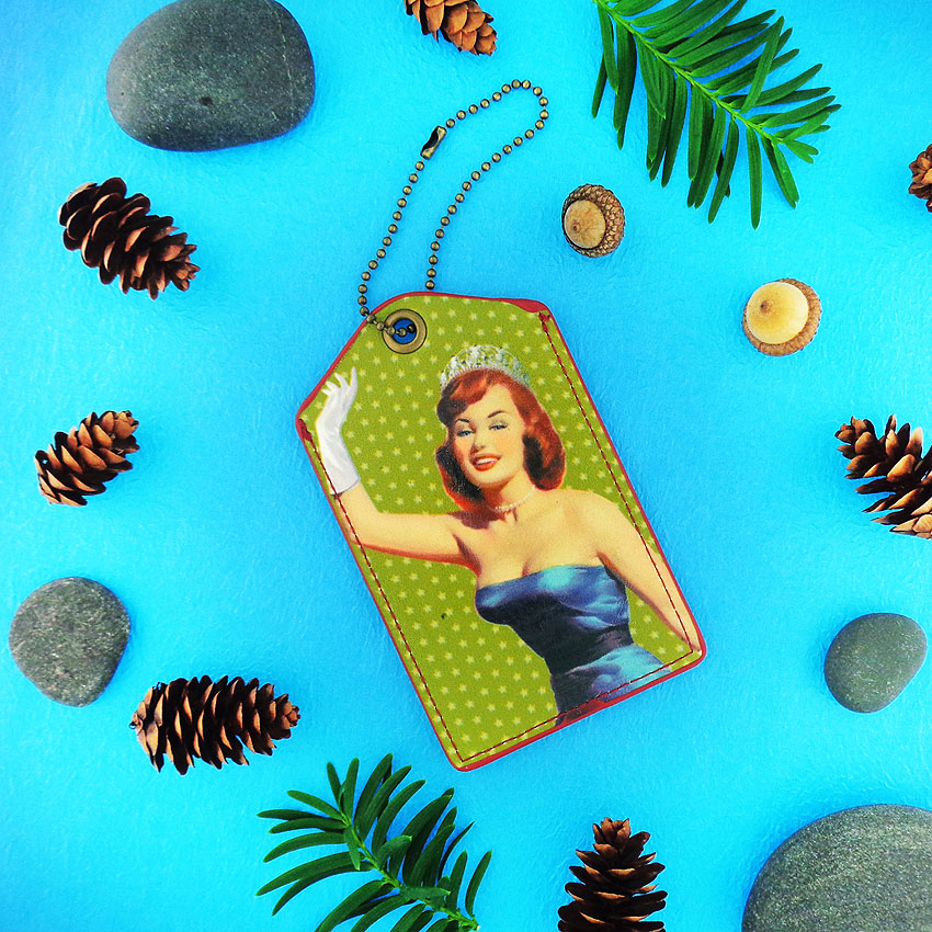 LAVISHY design & wholesale fun pinup girl vegan luggage tags to gift shops, clothing & fashion accessories boutiques, book stores and speciality retailers in Canada, USA and worldwide.