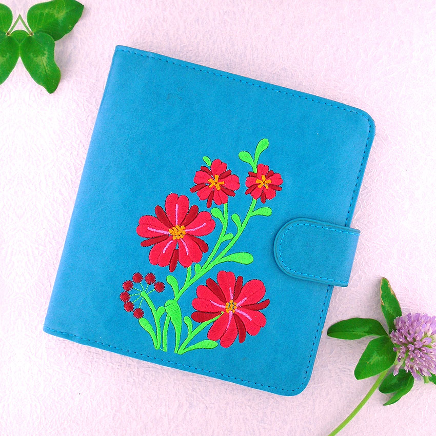 LAVISHY design & wholesale vegan embroidered passport wallets to gift shops, clothing & fashion accessories boutiques, book stores and speciality retailers in Canada, USA and worldwide.