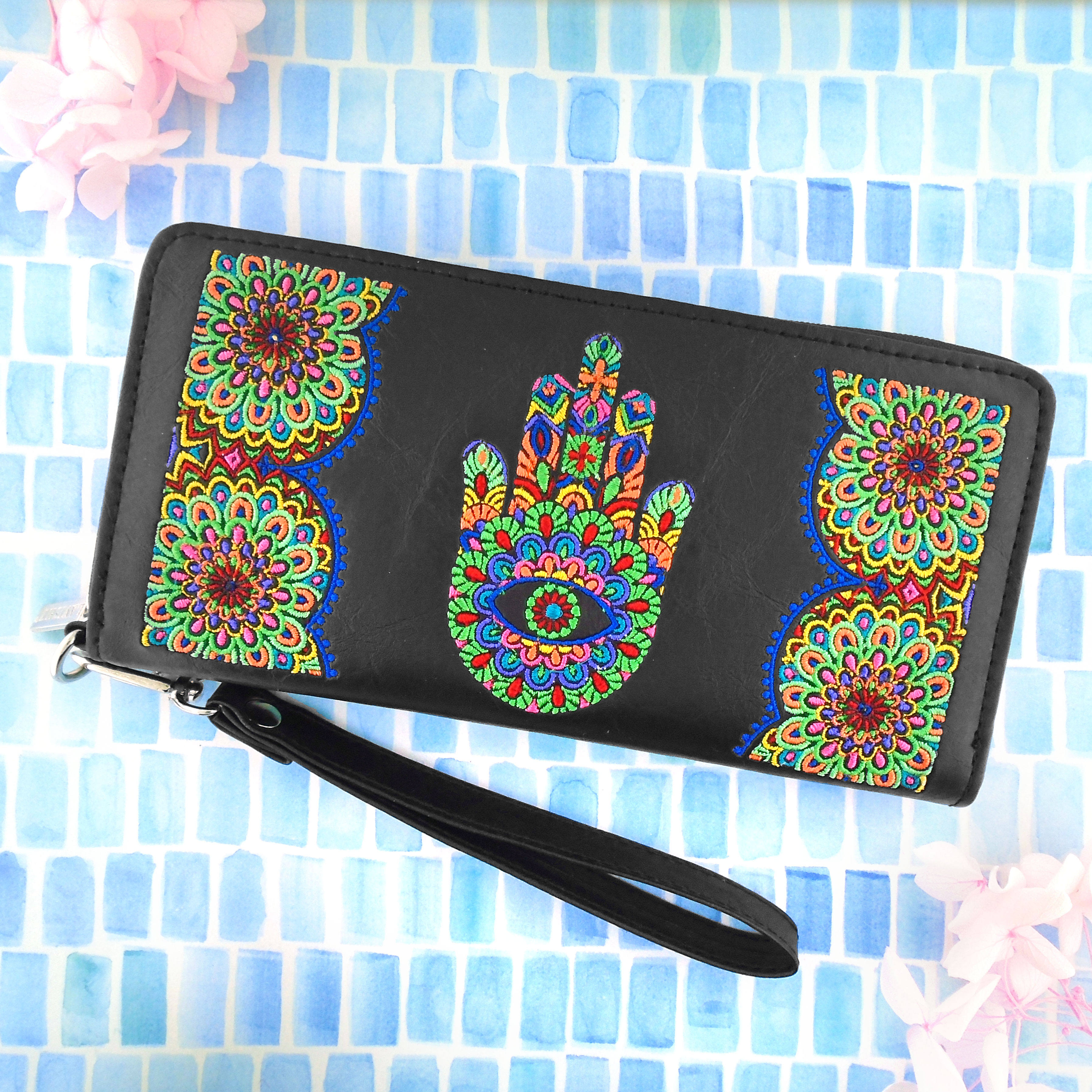 LAVISHY design & wholesale vegan embroidered wristlets to gift shops, clothing & fashion accessories boutiques, book stores and speciality retailers in Canada, USA and worldwide.